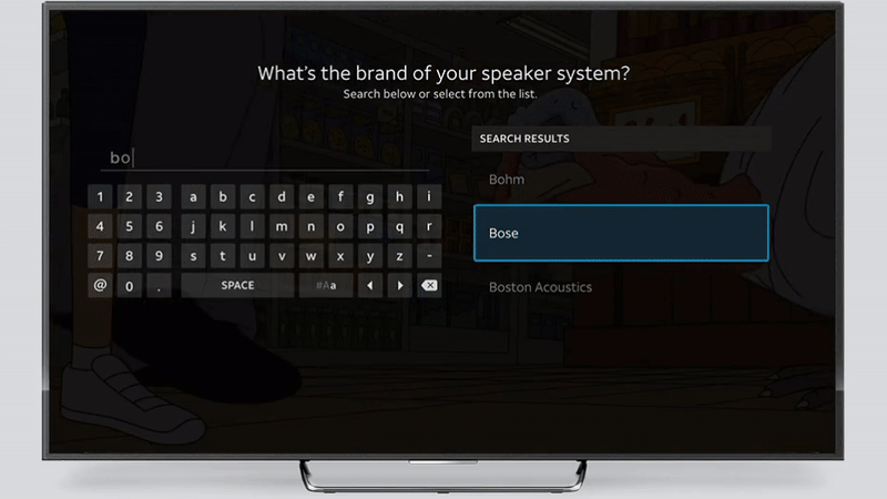 Animated Gif of remote programming flow on AT&T TV. Shows typing a sound system brand name, selecting Bose, and a subsequent screen that says Next, we'll run a few tests using your Bose speaker system. and has an illustration of speakers, a sound bar, and a subwoofer. Shortly after this appears, the AT&T TV remote appears below the speaker system illustration.